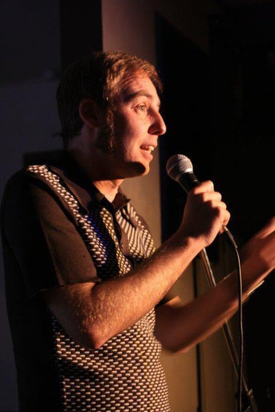 Performing at MostlyComedy.